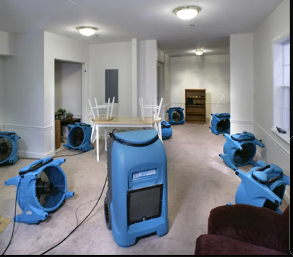 Air movers and dehumidifier setup for Water Damage Restoration in Brandywine